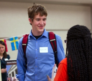 Student with nametag at group gathering